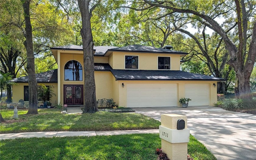 This rare opportunity in coveted Lake Magdalene Manors, one of - Beach Home for sale in Tampa, Florida on Beachhouse.com