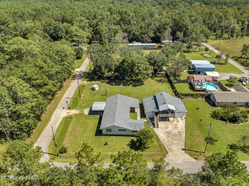 INVESTORS GET HAPPY!!! Or, if you've ever wanted to be your own - Beach Home for sale in Long Beach, Mississippi on Beachhouse.com