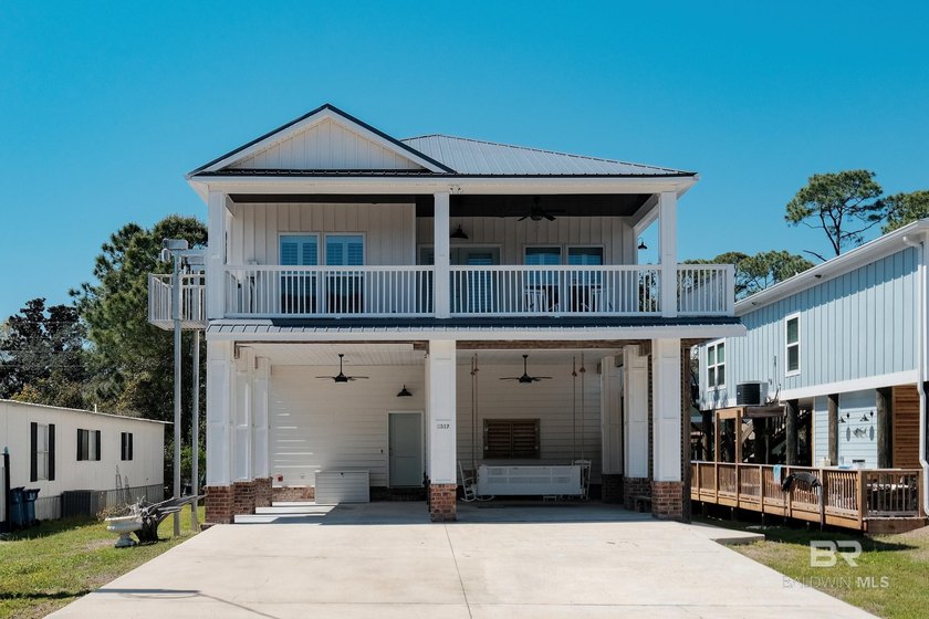 Custom built Gold Fortified home in desirable Bear Point - Beach Home for sale in Orange Beach, Alabama on Beachhouse.com