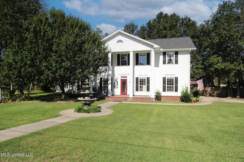 Discover this exquisite 4-bedroom home tucked away in - Beach Home for sale in Diamondhead, Mississippi on Beachhouse.com