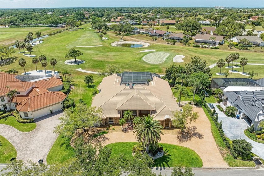 Behind the gates of Prestancia's coveted Estates section, this - Beach Home for sale in Sarasota, Florida on Beachhouse.com