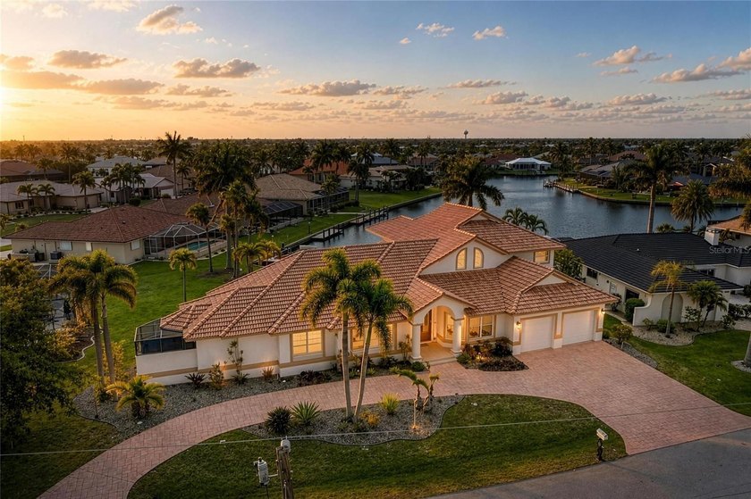 Tucked away on a quiet cul-de-sac, this exceptional custom-built - Beach Home for sale in Punta Gorda, Florida on Beachhouse.com