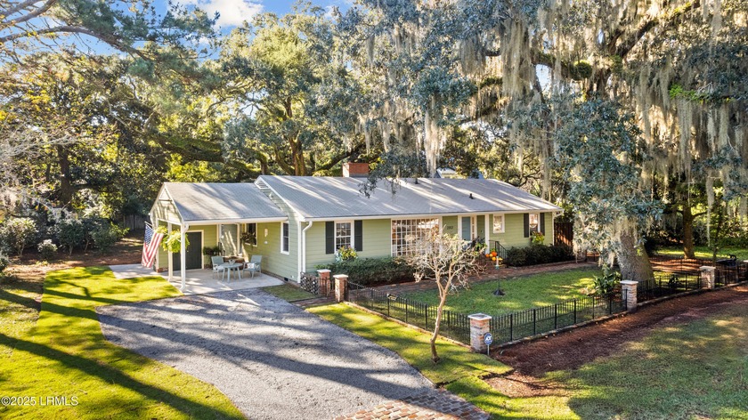Tucked beneath a canopy of moss-draped Live Oaks, this - Beach Home for sale in Beaufort, South Carolina on Beachhouse.com