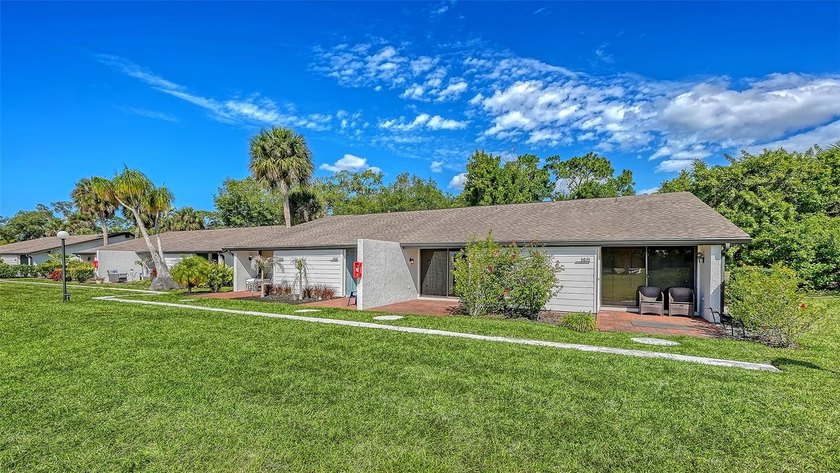 This villa has location, views and value! Enjoy fabulous golf - Beach Home for sale in Sarasota, Florida on Beachhouse.com