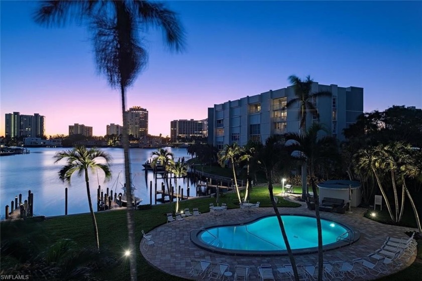 Rarely available corner residence with southwestern bay views - Beach Home for sale in Naples, Florida on Beachhouse.com