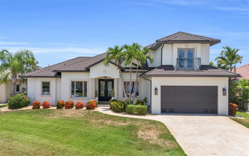 Discover this CUSTOM-built, one-of-a-kind WATERFRONT POOL home - Beach Home for sale in Punta Gorda, Florida on Beachhouse.com