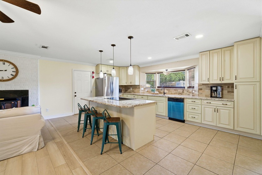 Welcome to a beautifully maintained corner-lot home that blends - Beach Home for sale in Navarre, Florida on Beachhouse.com