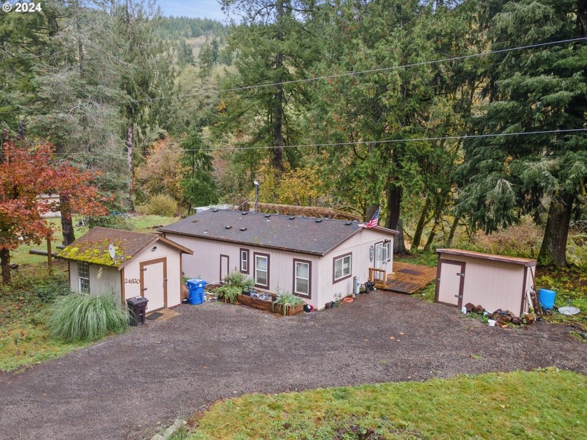 Nestled in the serene Trask River mountain range, this cozy - Beach Home for sale in Tillamook, Oregon on Beachhouse.com