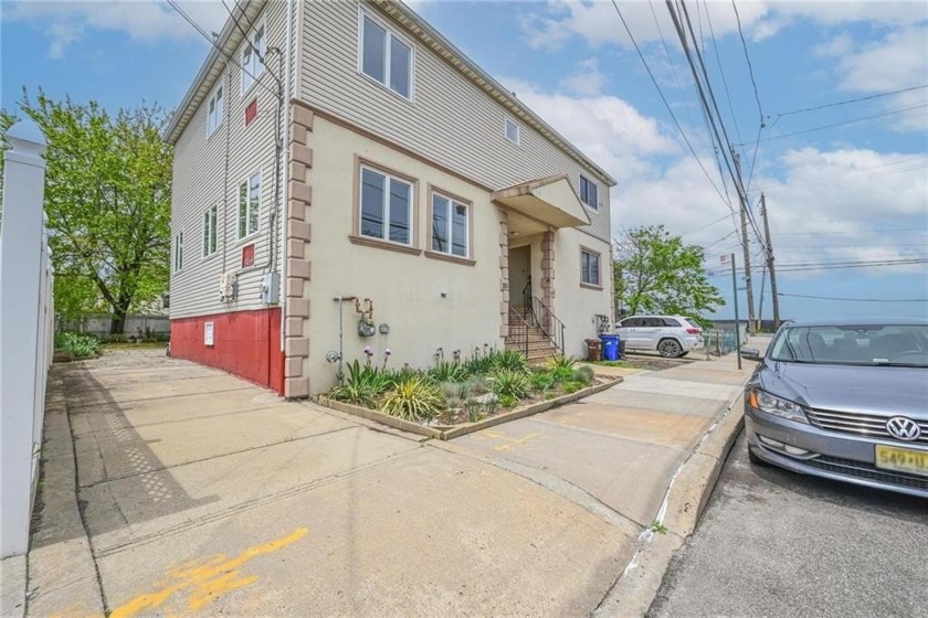 Welcome to this stunning 3-bedroom, 2.5-bathroom semi-detached - Beach Home for sale in Queens, New York on Beachhouse.com