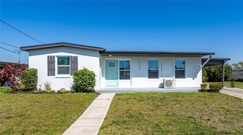 Discover timeless mid-century charm in this beautifully updated - Beach Home for sale in Port Charlotte, Florida on Beachhouse.com
