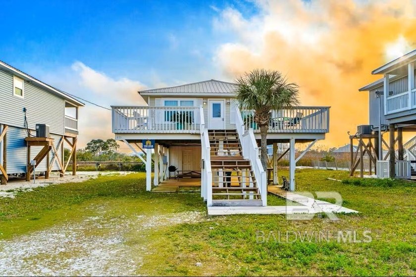Enjoy the best of coastal living with breathtaking views of - Beach Home for sale in Gulf Shores, Alabama on Beachhouse.com