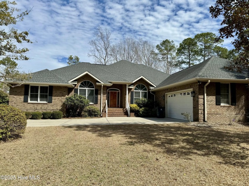 This expansive residence boasts 3 bedrooms, 3.5 bathrooms, and - Beach Home for sale in Sunset Beach, North Carolina on Beachhouse.com