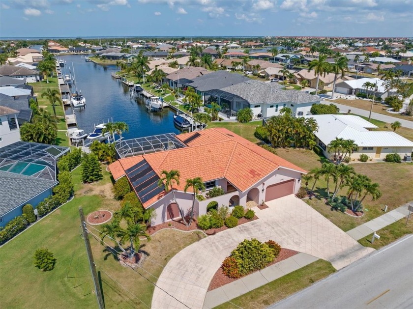 Improved Price for this WATERFRONT 3/2/2 POOL HOME WITH QUICK - Beach Home for sale in Punta Gorda, Florida on Beachhouse.com