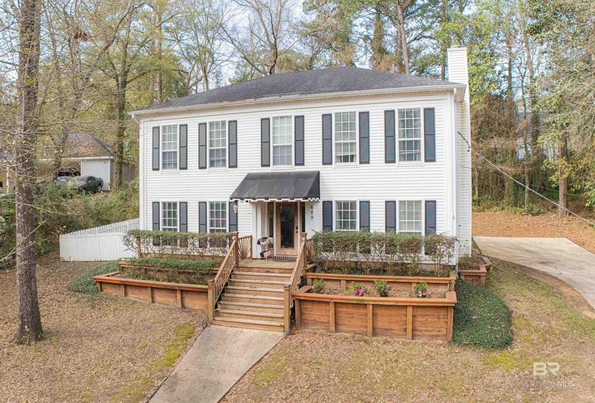 Gorgeous curb appeal meets an abundance of space throughout this - Beach Home for sale in Daphne, Alabama on Beachhouse.com