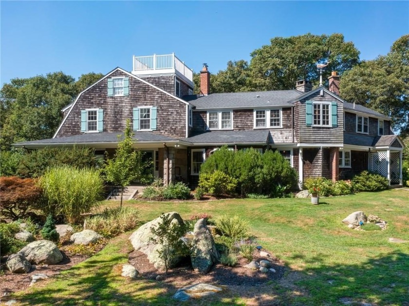 Nestled in Matunuck Hills, the storied estate known as *Wave - Beach Home for sale in South Kingston, Rhode Island on Beachhouse.com