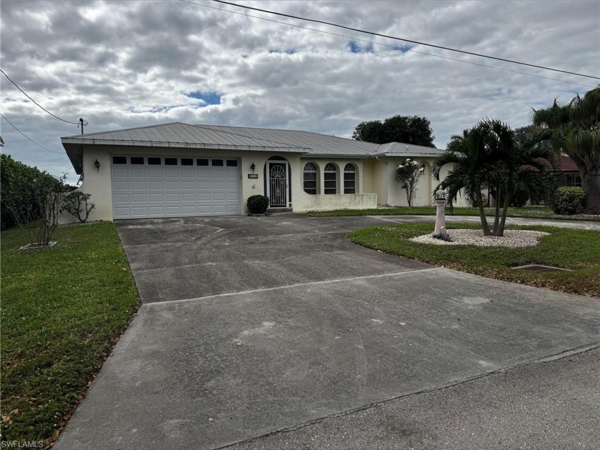 OPPORTUNITTY AWAITS! Transform this fixer-upper into your dream - Beach Home for sale in Cape Coral, Florida on Beachhouse.com