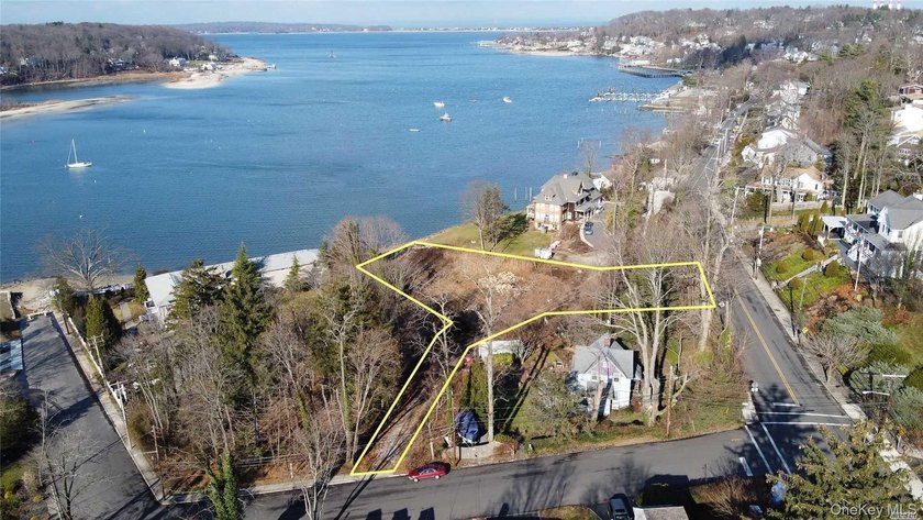 Set on .66 private acres with 80 feet of waterfront, this - Beach Lot for sale in Northport, New York on Beachhouse.com