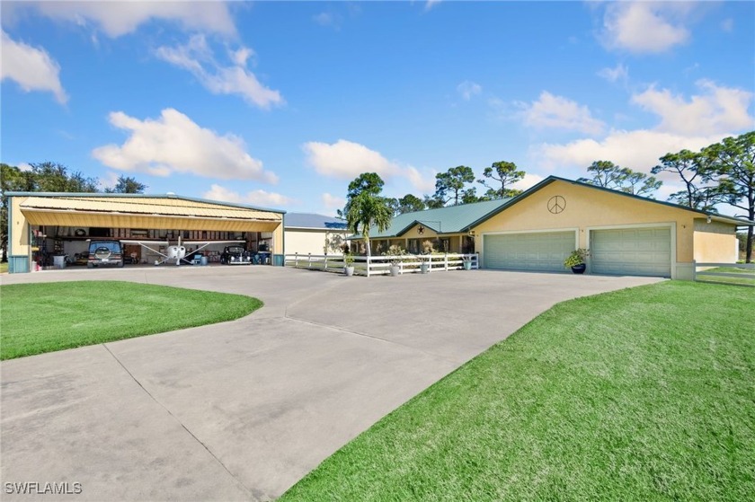 It is every pilots dream to live with their plane at their home - Beach Home for sale in North Fort Myers, Florida on Beachhouse.com