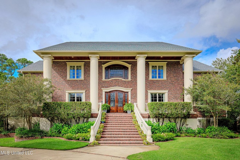 Absolutely breathtaking. Grand entry with floating staircase and - Beach Home for sale in Ocean Springs, Mississippi on Beachhouse.com