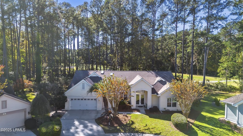 Nestled right off the 7th fairway, this impressive Rutledge - Beach Home for sale in Bluffton, South Carolina on Beachhouse.com