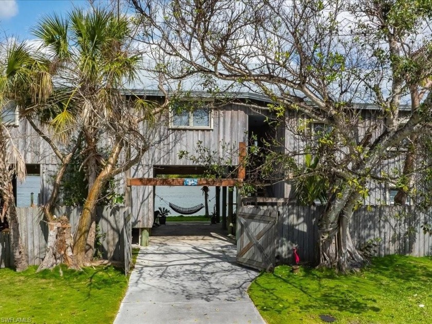 Affectionately called Pelican landing this 4/3 stilt home with a - Beach Home for sale in Goodland, Florida on Beachhouse.com