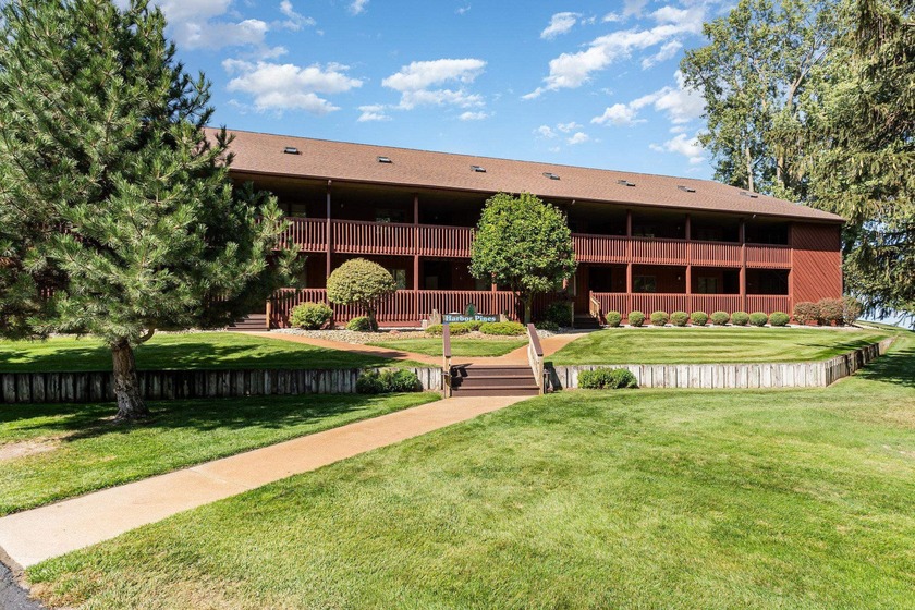 Enjoy breathtaking views of Lake Huron from this Waterfront - Beach Condo for sale in Port Austin, Michigan on Beachhouse.com