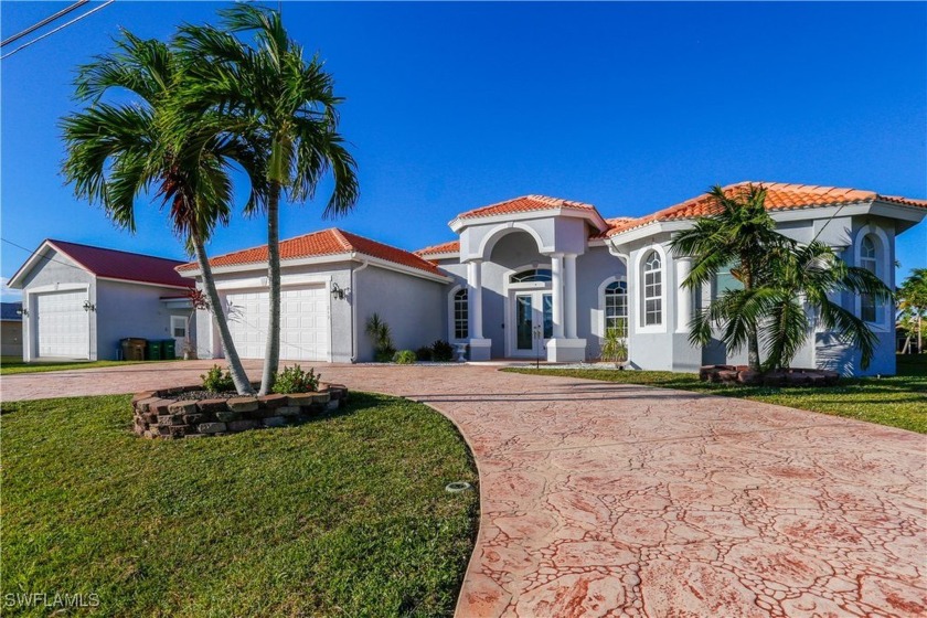 This amazing Starlight built pool home on a 4 lot freshwater - Beach Home for sale in Cape Coral, Florida on Beachhouse.com