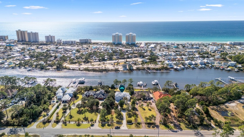 A rare and luxurious waterfront offering, this stunning - Beach Home for sale in Panama City Beach, Florida on Beachhouse.com
