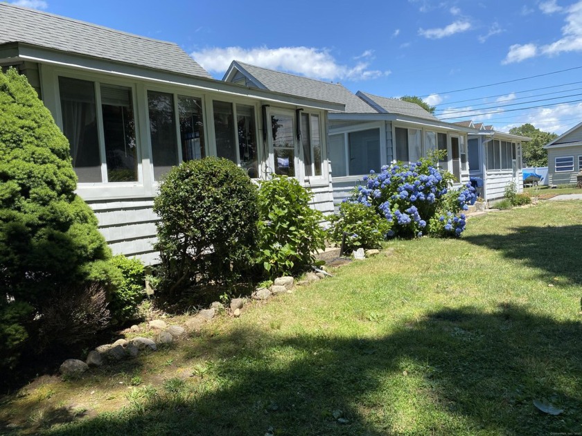 Welcome to this charming seasonal cottage, a delightful blend of - Beach Home for sale in Old Lyme, Connecticut on Beachhouse.com