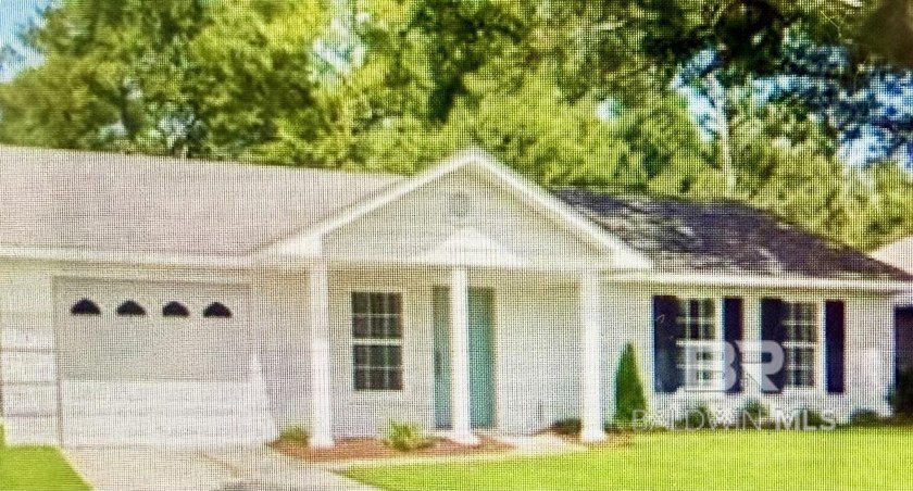 Charming coastal white brick home offering a blend of comfort - Beach Home for sale in Lillian, Alabama on Beachhouse.com