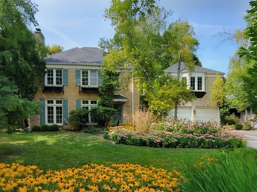 A charming brick 4-bedroom home nestled east of Lake Drive! - Beach Home for sale in Bayside, Wisconsin on Beachhouse.com