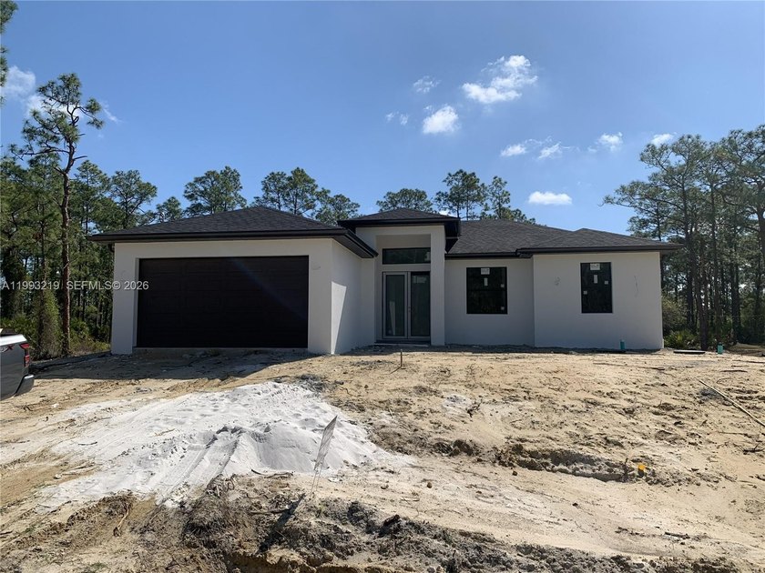 New Construction Home on Half Acre. This stunning new - Beach Home for sale in Lehigh Acres, Florida on Beachhouse.com