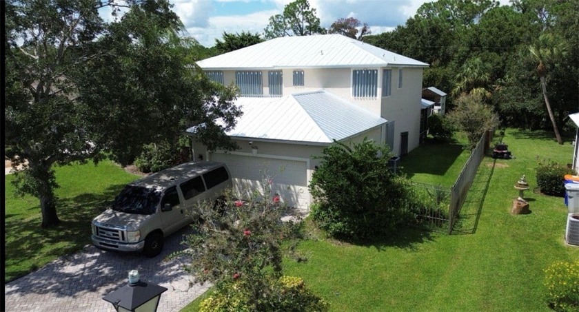 NEW METAL ROOF! Welcome to your dream home in the heart of Vero - Beach Home for sale in Vero Beach, Florida on Beachhouse.com