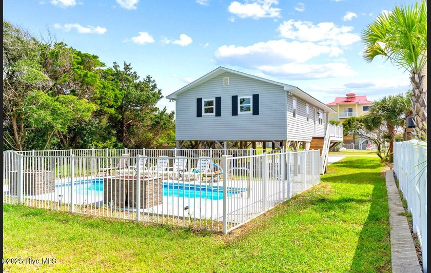 Your water wonderland awaits! Step into paradise with this - Beach Home for sale in Oak Island, North Carolina on Beachhouse.com