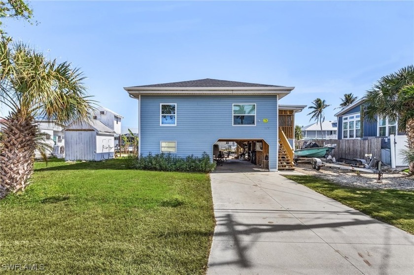 This turnkey furnished 2-bedroom, 2-bathroom home sits on the - Beach Home for sale in St. James City, Florida on Beachhouse.com