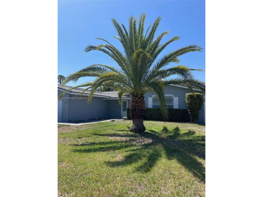 Spacious 4/2 Single Family Pool Home on a Canal in the center of - Beach Home for sale in Coral Springs, Florida on Beachhouse.com