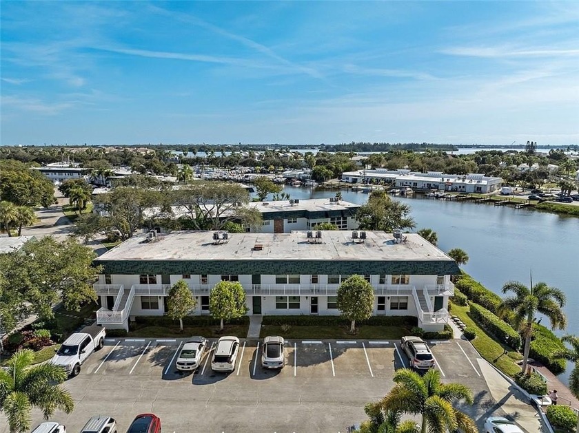 Light-filled and perfectly situated on the river, this - Beach Condo for sale in Vero Beach, Florida on Beachhouse.com