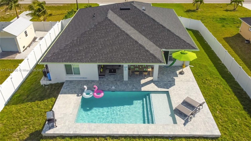 Stunning new single-family home with 4 spacious bedrooms and 2 - Beach Home for sale in Cape Coral, Florida on Beachhouse.com