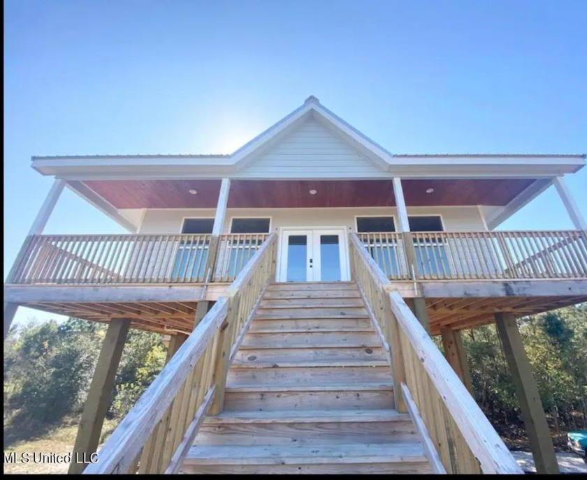 PRICE REDUCED! Just 100 yards from the picturesque Jourdan River - Beach Home for sale in Bay Saint Louis, Mississippi on Beachhouse.com