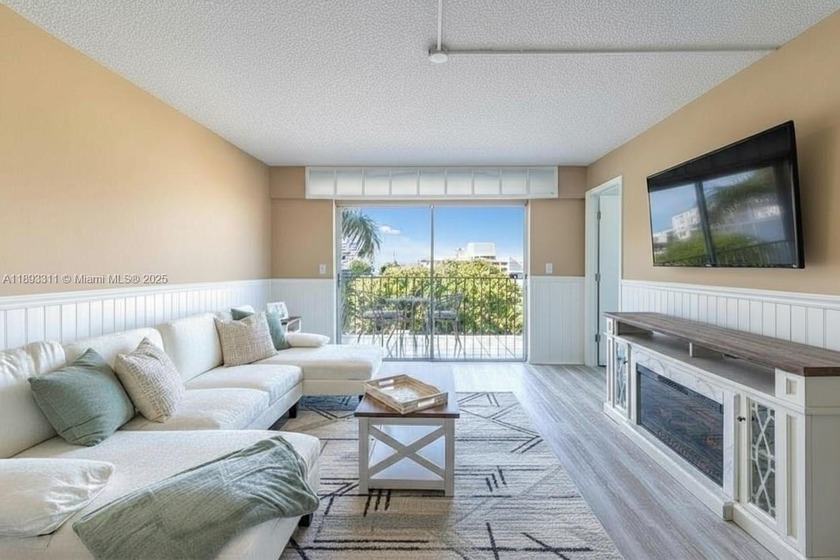 Experience abundant natural light and incredible privacy in this - Beach Condo for sale in Miami Beach, Florida on Beachhouse.com