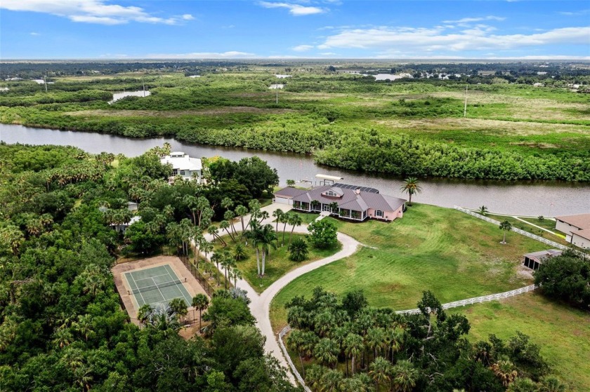 STUNNING REMODEL! PRIVATE AND PEACEFUL SLICE OF HEAVEN! This - Beach Home for sale in Punta Gorda, Florida on Beachhouse.com