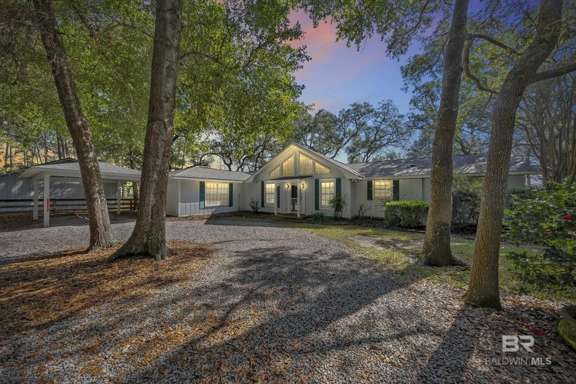 Experience the beauty of waterfront living on Perdido Bay in the - Beach Home for sale in Lillian, Alabama on Beachhouse.com