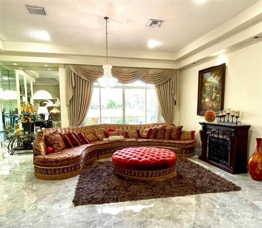 Located behind the prestigious guard-gated entrances of Eagle - Beach Home for sale in Coral Springs, Florida on Beachhouse.com