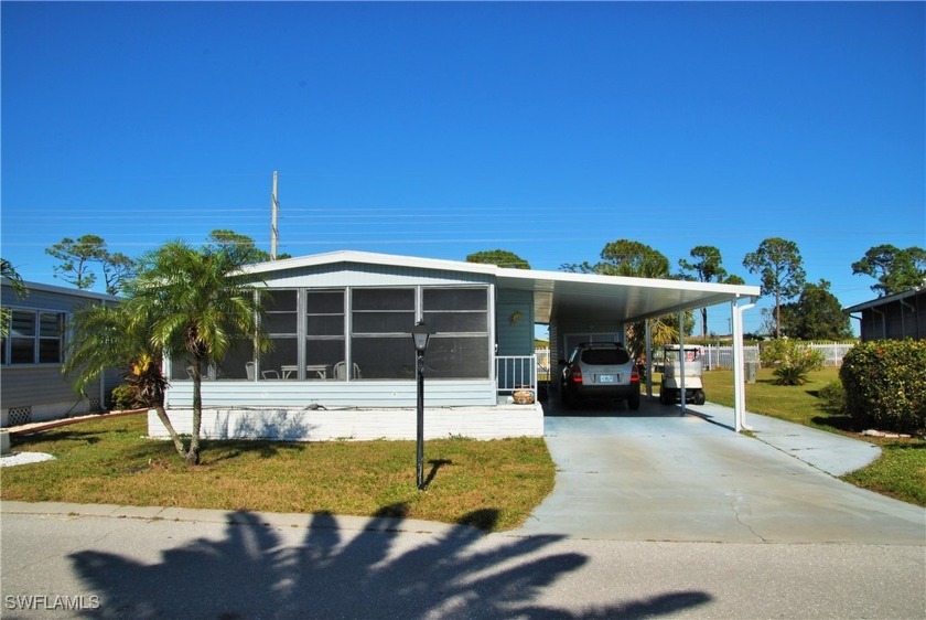 Modern upgrades and an exceptional location near the clubhouse - Beach Home for sale in North Fort Myers, Florida on Beachhouse.com