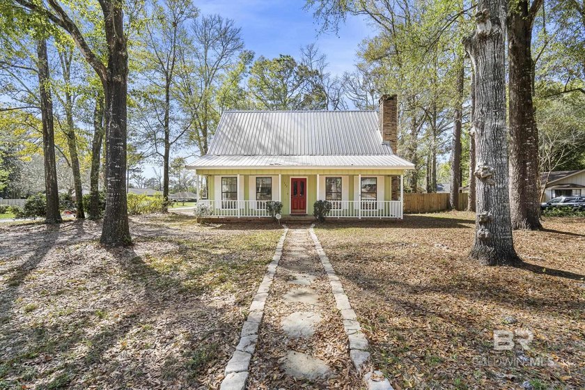 Welcome to this charming Creole cottage located near the Windsor - Beach Home for sale in Daphne, Alabama on Beachhouse.com