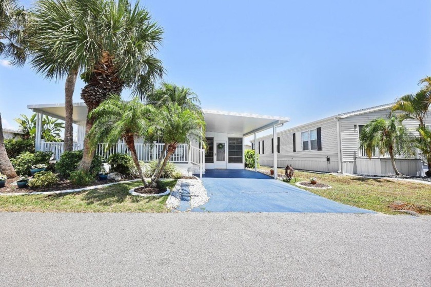 Welcome to your Florida retreat! This charming 1977 manufactured - Beach Home for sale in Port Charlotte, Florida on Beachhouse.com