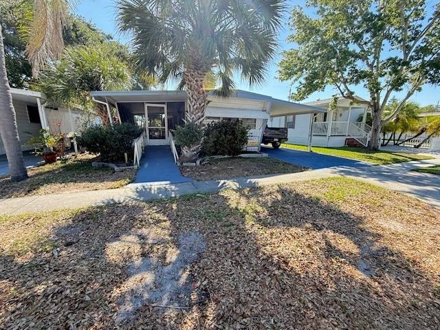 Welcome to easy, stylish living in Lake Haven, a sought-after - Beach Home for sale in Dunedin, Florida on Beachhouse.com