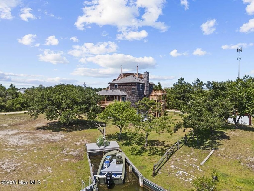 Coastal living at its finest. This inviting three-story Corova - Beach Home for sale in Corolla, North Carolina on Beachhouse.com