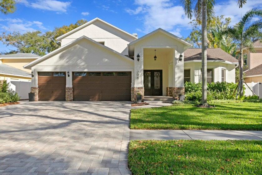 Welcome home to this California Contemporary style home situated - Beach Home for sale in Tampa, Florida on Beachhouse.com