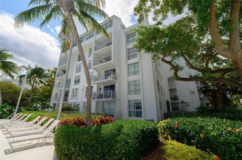 Nestled in Miami's best-kept secret oasis, this bayfront - Beach Condo for sale in Miami, Florida on Beachhouse.com